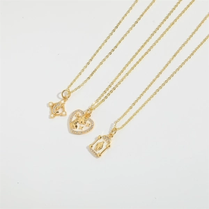 Elegant gold necklace set featuring heart, square, and rectangular pendants with crystal inlay