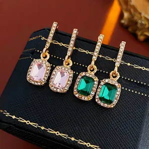 Elegant emerald-cut square crystal earrings in green and pink with diamond accents