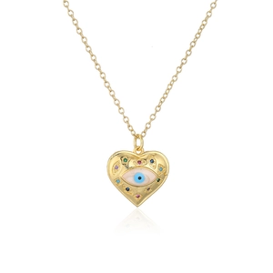 Detailed view of an 18K gold heart pendant necklace with blue evil eye and colorful zircon