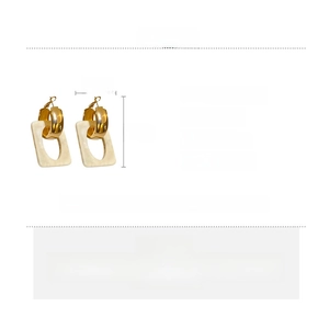 Detail showing marble texture resin pendant with golden alloy hoop earring specs