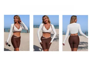 Three-piece beach set featuring a white cover-up, v-neck top, and high-waisted coffee shorts
