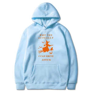 Detail of light blue Halloween hoodie with orange witch riding broom and funny quote print