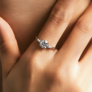 Three-stone S925 sterling silver ring with a round center diamond and baguette side stones