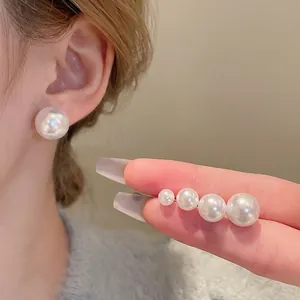 French retro pearl stud earrings for women shown in four sizes with elegant luster