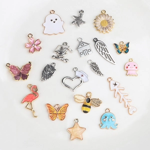 Detailed collection of assorted colorful enamel DIY pendants for jewelry and bags