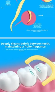 Detail of yellow dental floss pick with non-slip handle and ultra-fine polymer fiber