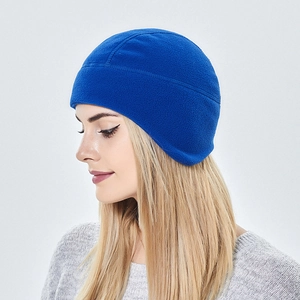Detail of royal blue fleece cycling cap showing soft windproof material and ear coverage