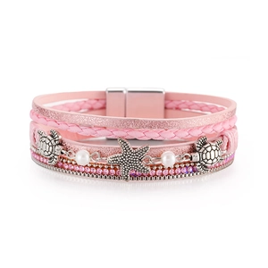 Detail of pink multilayer leather bracelet with silver sea turtle and starfish charms