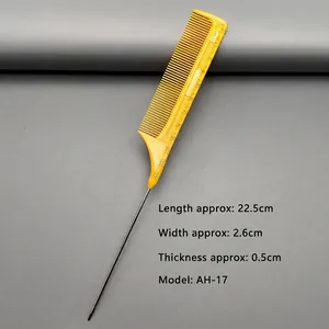 Detailed view of yellow hair styling comb with precise scale and metal pin tail handle