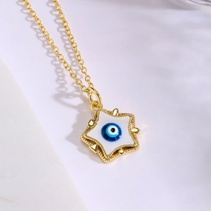 18K gold plated necklace featuring a star pendant with a blue evil eye enamel design