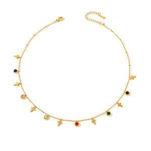 Detail of gold-plated necklace featuring colorful round zircons and small cross pendants