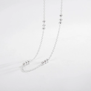 Minimalist S925 sterling silver beaded necklace featuring polished small round spacer beads