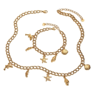 Golden ocean series jewelry set featuring starfish and seahorse pendants on chunky chains