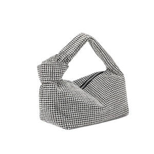 Sparkling silver rhinestone handbag with stylish knotted handle and luxury crystal finish