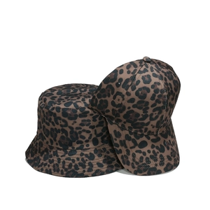 Leopard print hat set featuring a stylish wide brim bucket hat and a classic baseball cap
