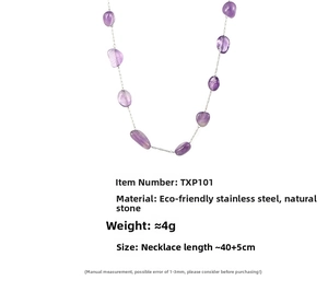 Macro shot of irregular natural purple amethyst stone necklace with stainless steel chain
