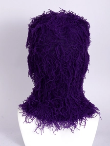 Detailed close-up of dark purple knit balaclava with long plush fringe texture