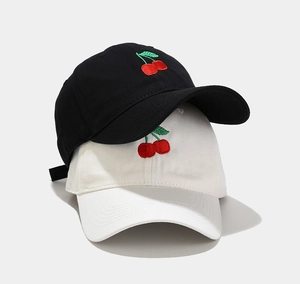 Classic cotton baseball caps with cherry embroidery in black and white styles