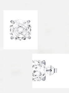 Macro detail of S925 sterling silver studs with 5A grade rose cut sparkling zircon stones