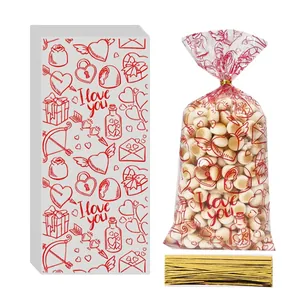 Valentine's heart patterned clear candy bags with gold ties for cookies and treats