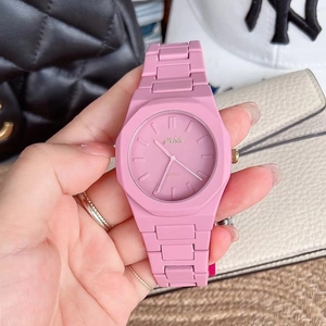 Pink silicone strap watch for women with quartz movement and clear Melodi brand dial