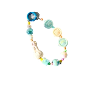 Cute beaded phone lanyard with cartoon bear beads, soft plush ball, and blue metal clip