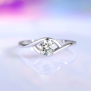 Artistic eye-shaped twisted 0.5ct Moissanite ring in 925 sterling silver with four prongs