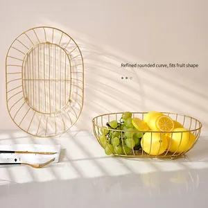 Nordic golden iron wire fruit basket with oval hollow grid design for home storage