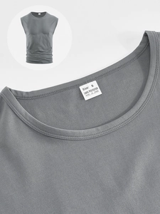 Detail of grey crew neck sleeveless tank top showing fabric texture and neckline tag