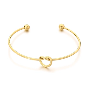 Minimalist knot design open cuff bracelet in polished gold stainless steel finish