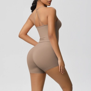 Detail of cross-back straps on khaki sports romper with high-elastic compression fabric