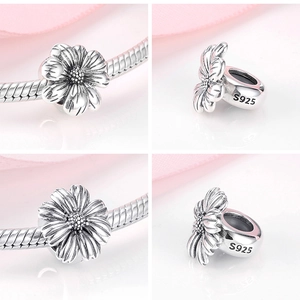 Detailed views of S925 sterling silver daisy charm bead showing hallmarks and flower texture