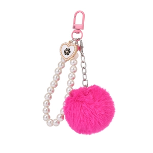 Porte-clés pompon rose avec chaîne en perles blanches et breloque cœur camélia