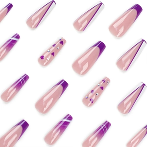 Purple French press-on nails with white lines, heart accents, and rhinestones in coffin shape