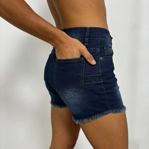 Detail of dark blue high waist denim shorts with raw fringe hem and back pockets