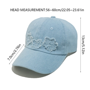 Detail view of denim baseball cap with floral embroidery and size dimensions
