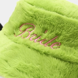 Detail of lime green faux fur bucket hat with pink Bride embroidery and soft texture