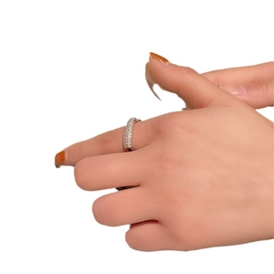 Elegant geometric silver square ring with shimmering micro-pave crystals on hand