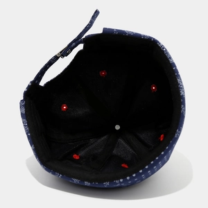 Adjustable dark blue paisley brimless docker hat with vintage street style and metal eyelets