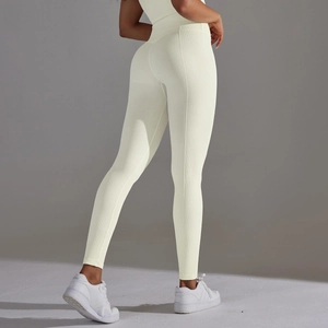 Detail of high-waisted yoga pants with honeycomb texture for butt-lifting effect