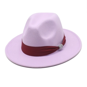 Detail of lavender wool fedora hat with burgundy satin ribbon and rhinestone buckle