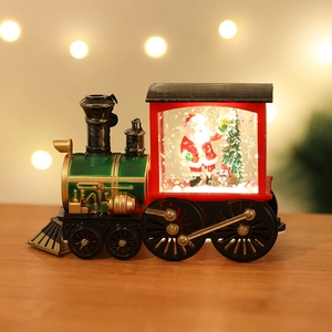 Christmas steam train lantern with Santa and glitter snow globe inside warm glow