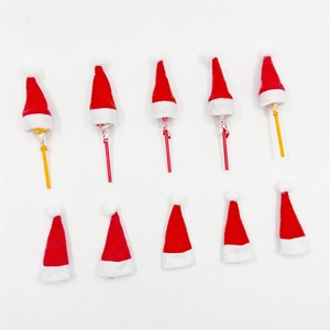 Detailed view of ten mini red and white felt Christmas lollipop covers for holiday decor
