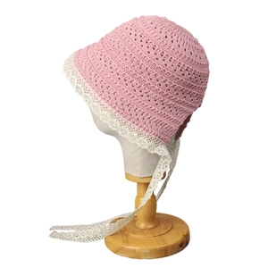 Vintage pink hollow-out knit sun hat with elegant white lace trim and ties