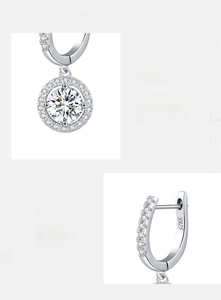 Detailed view of S925 hallmark and sparkling moissanite stones on silver hoop earrings