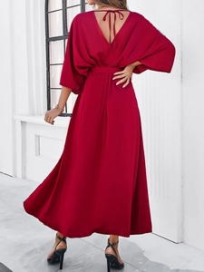 Elegant red V-neck backless maxi dress with batwing sleeves and tie-back detail