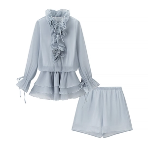 Light blue two-piece set with long sleeve ruffle top, 3D floral collar, and matching shorts