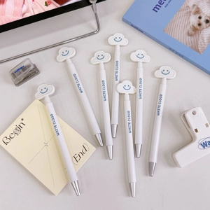 Close-up of 0.5mm black ink pens with cute cloud toppers and blue accents for students