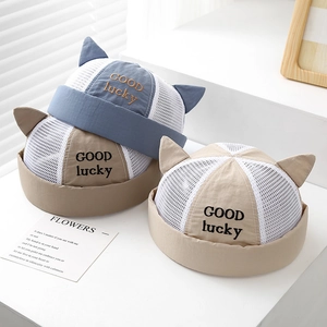 Three colors of breathable mesh cat ear docker hats for kids featuring Good Lucky embroidery