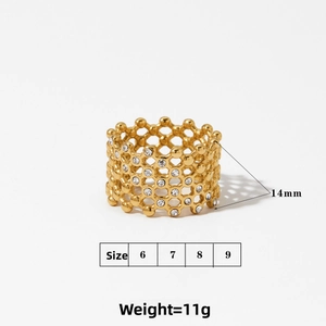 Macro shot showing 14mm width and 11g weight of the gold hollow mesh ring